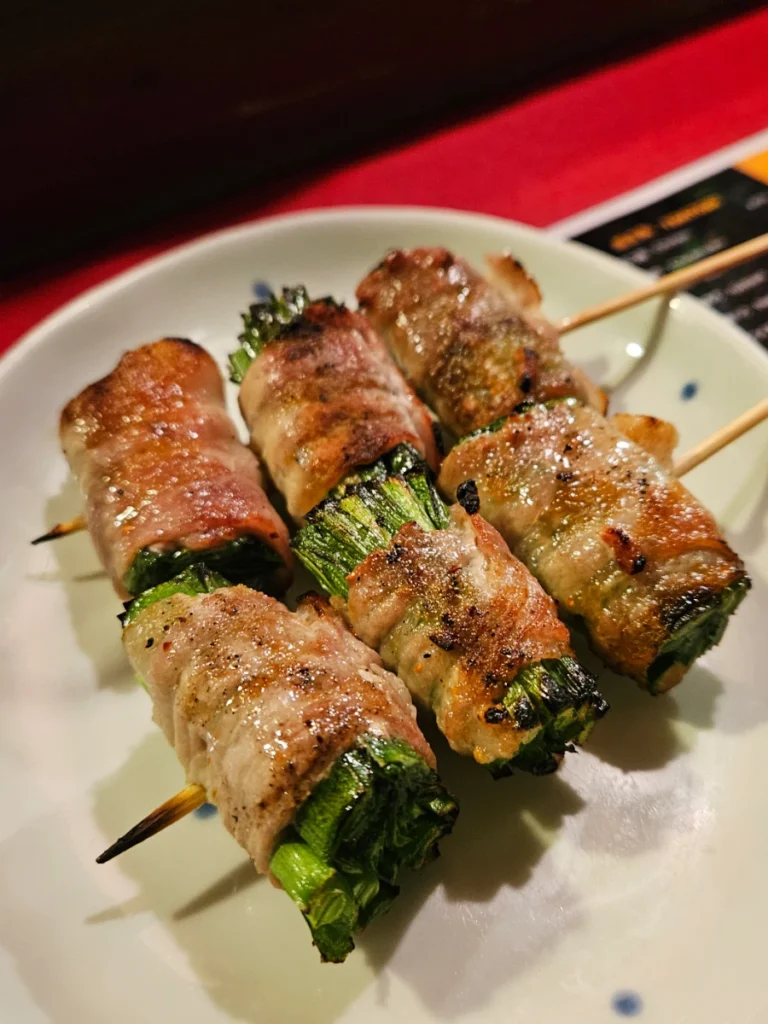 Yummy pork belly and green onion yakitori.