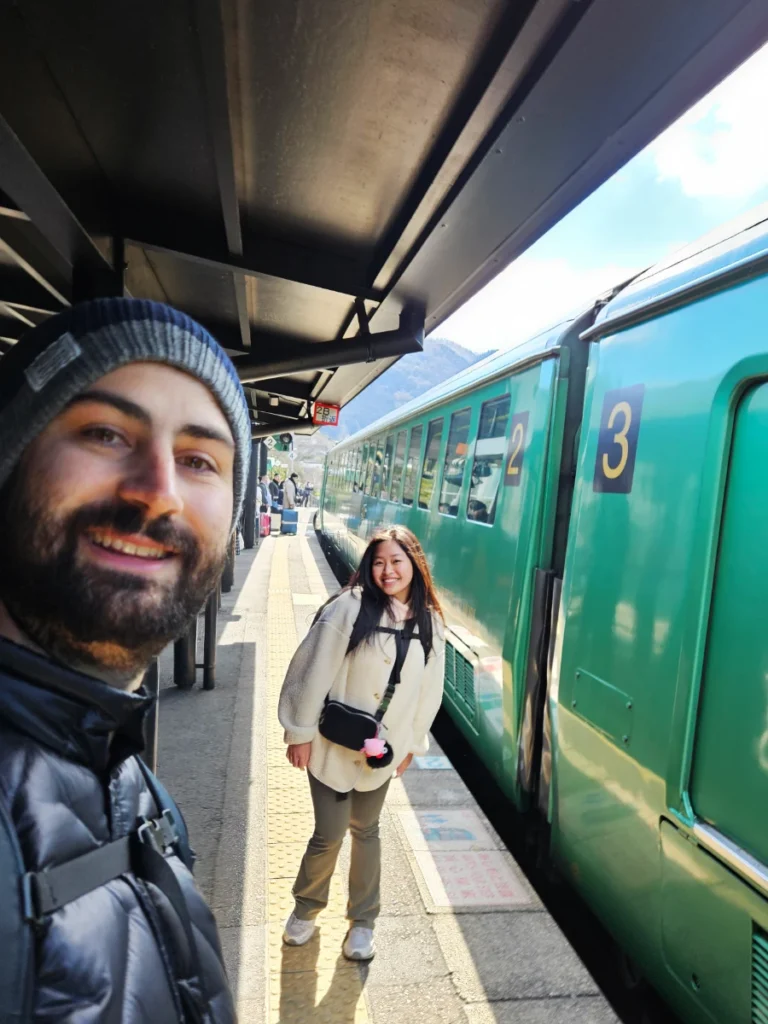 Tim and Zoe in front of the famous Yufuin No Mori train.