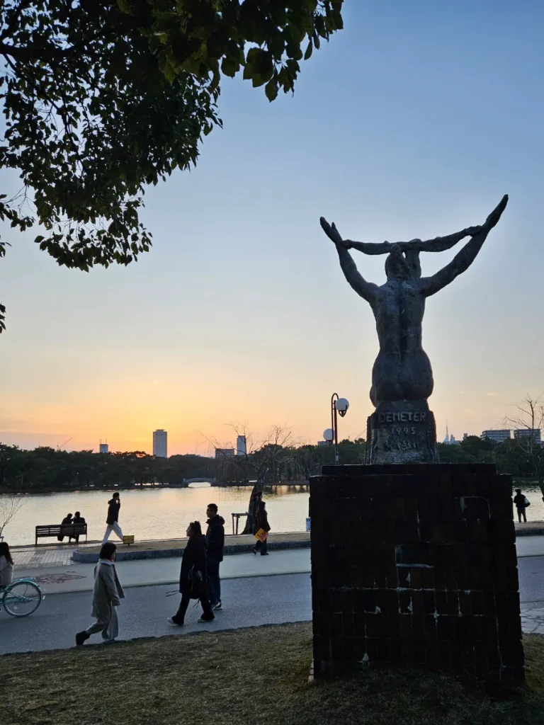 Demeter statue overlooking Ohori Pond and Ohori Park's exercise path.