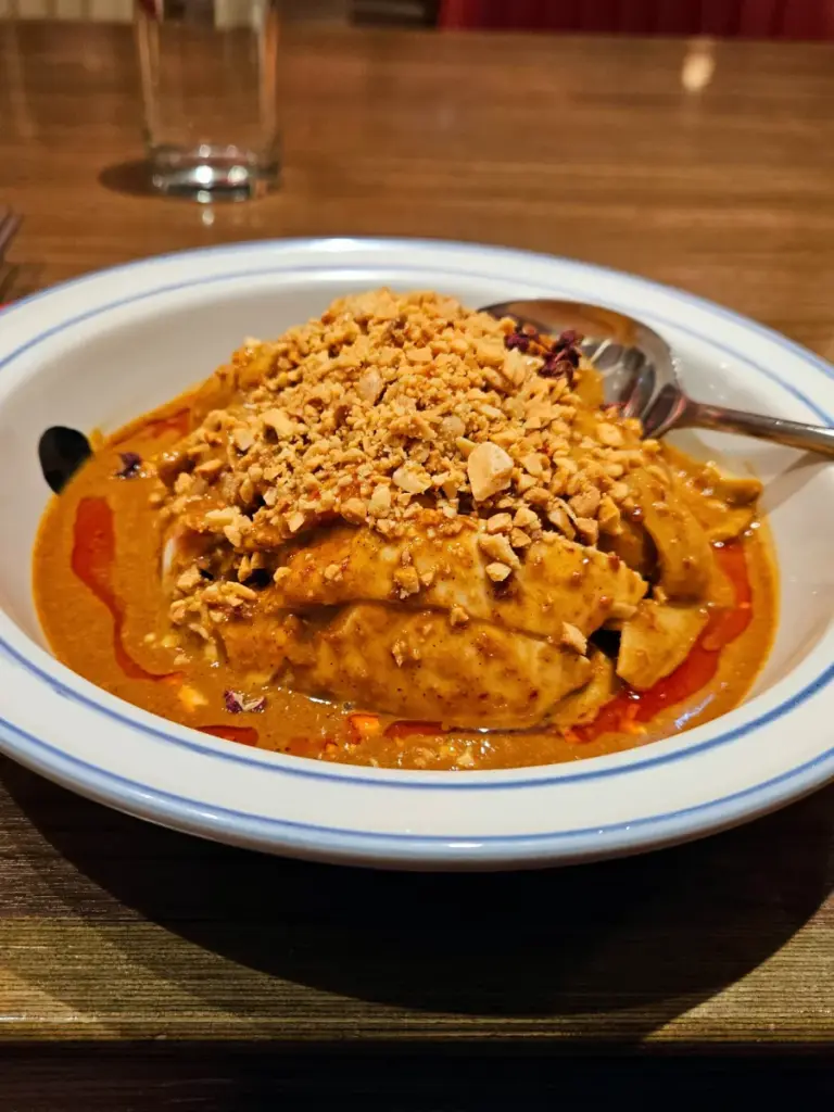 A plate of spicy Sichuan chicken topped with crushed peanuts from Kaifun Breeze after finishing the Elephant Mountain hike.